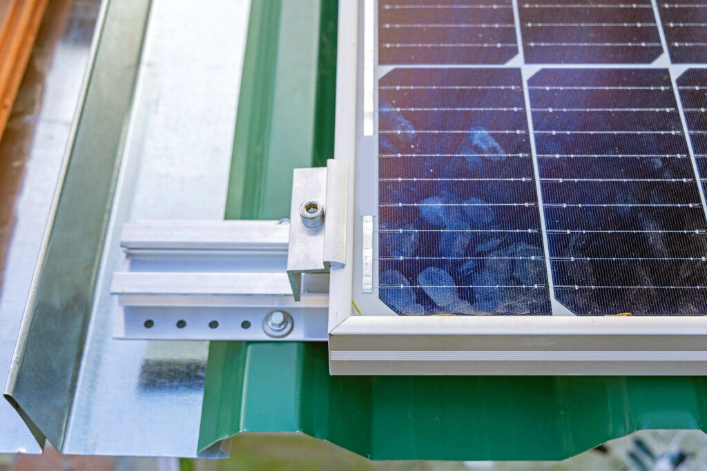 Solar Panel Mounting Brackets at House Corrugated Metal Roofing in Athens, Texas.