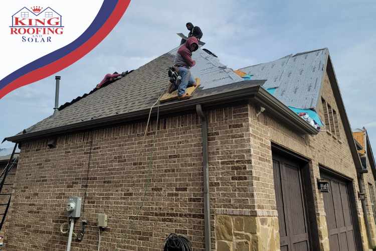Athens roofing company crew assessing roof renovation on a modern home.